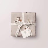 Cars muslin swaddle folded and tied with twine